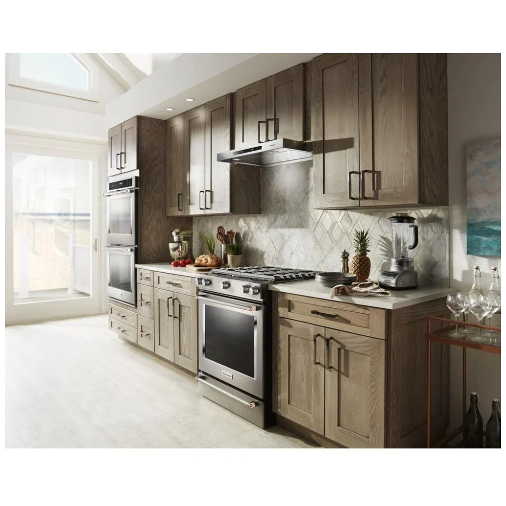 KitchenAid 30" 5-Burner Gas Slide-In Range with Even-Heat™ True Convection, Stainless Steel, Installed in a Modern Kitchen.