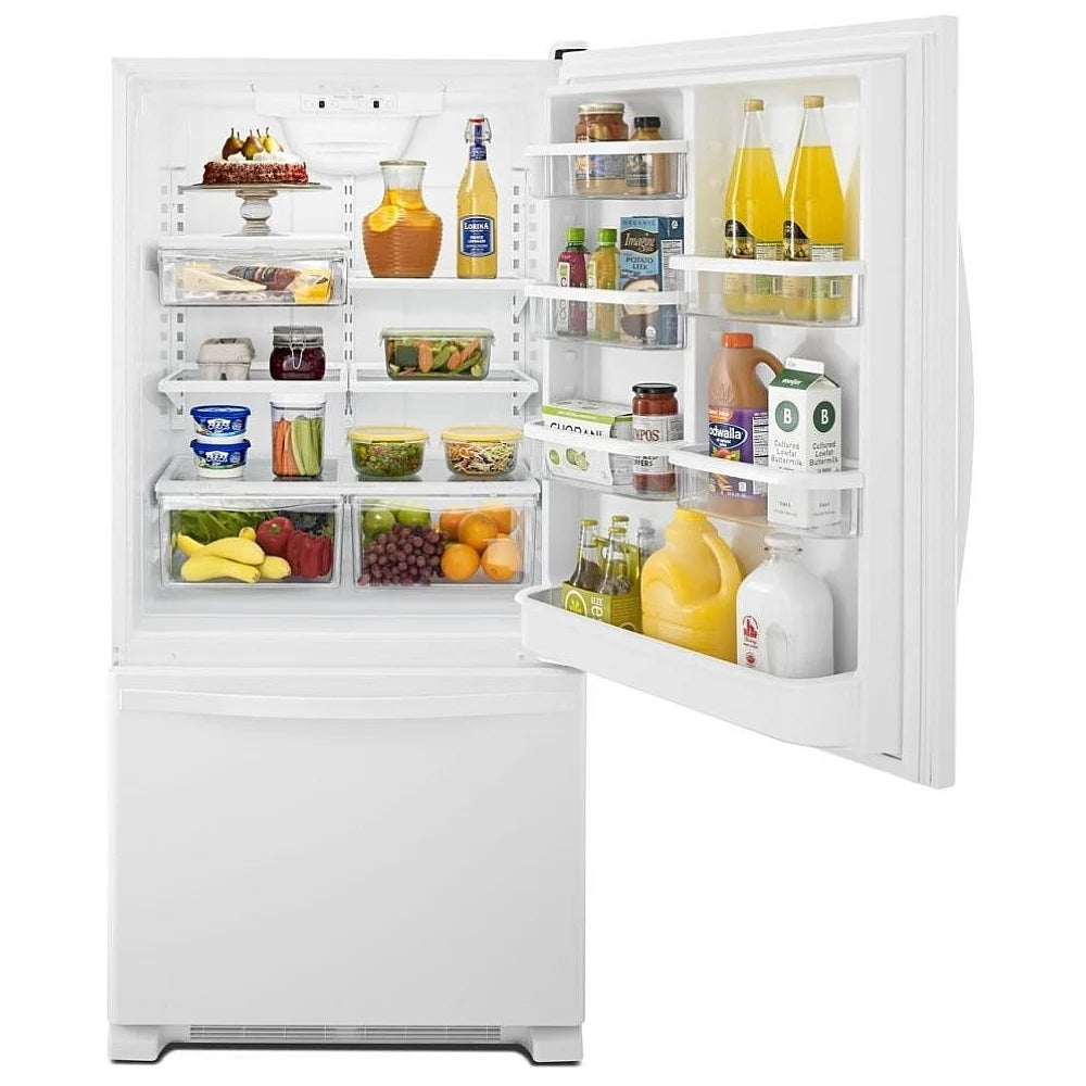 Interior of Whirlpool WRB329RFBW refrigerator showing adjustable shelves and bottom freezer drawer